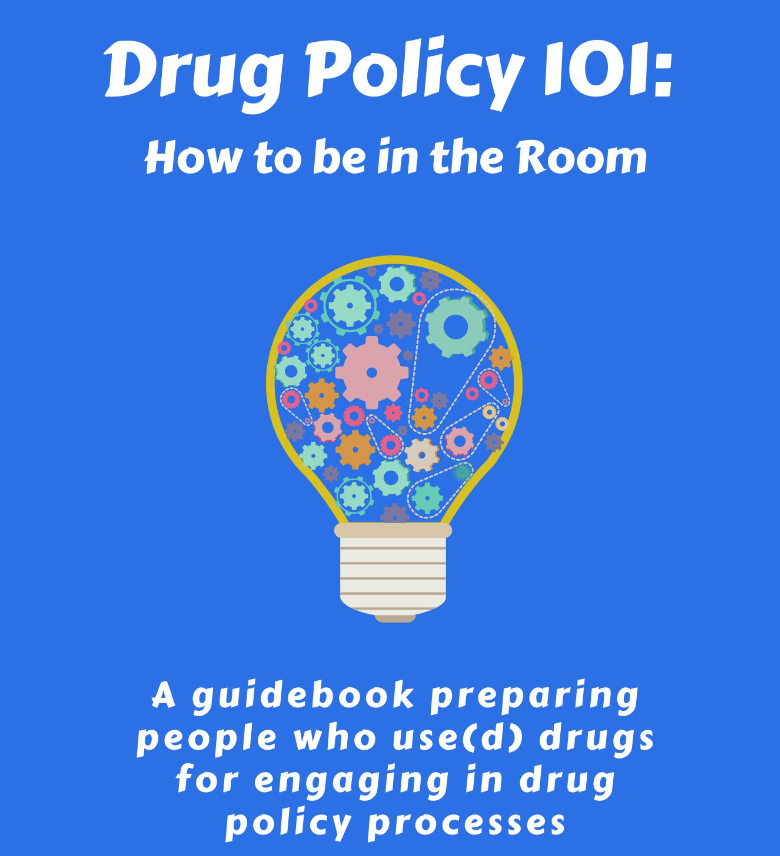 A light blue background with white text reads "Drug Policy 101: How to be in the Room" and "A guidebook preparing people who use(d) drugs for engaging in drug policy processes" with a drawing of a light bulb that has many small gears within it.